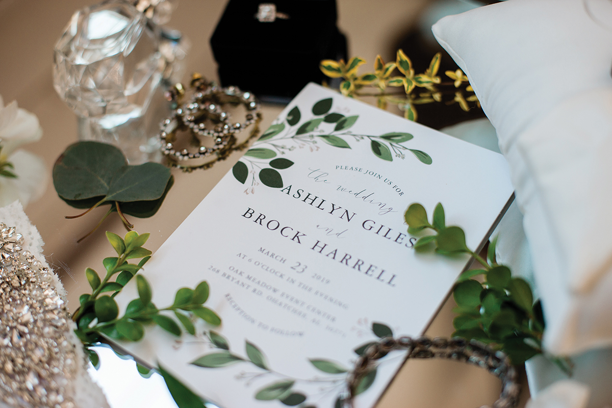 Ashlyn + Brock Harrell wedding Oak Meadow wedding invitation green leaves