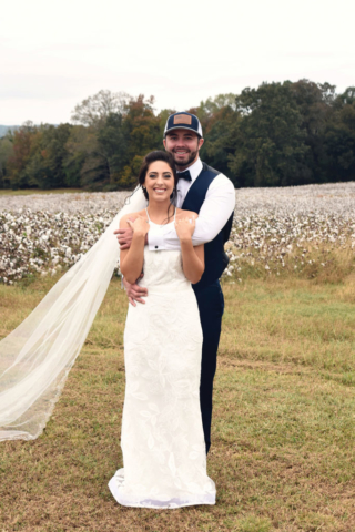 Jordan + Jordan Moore wedding couple in front of cotton field