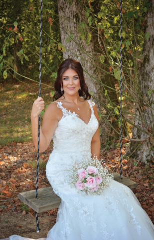 Shannon Naylor wedding sitting on swing