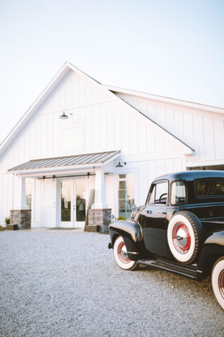 oak meadow event center wedding venue barn and vintage car