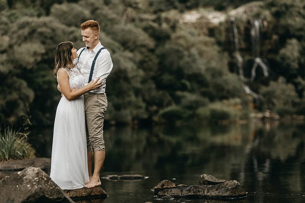 couple eloping by the river