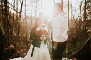 couple eloping in the woods