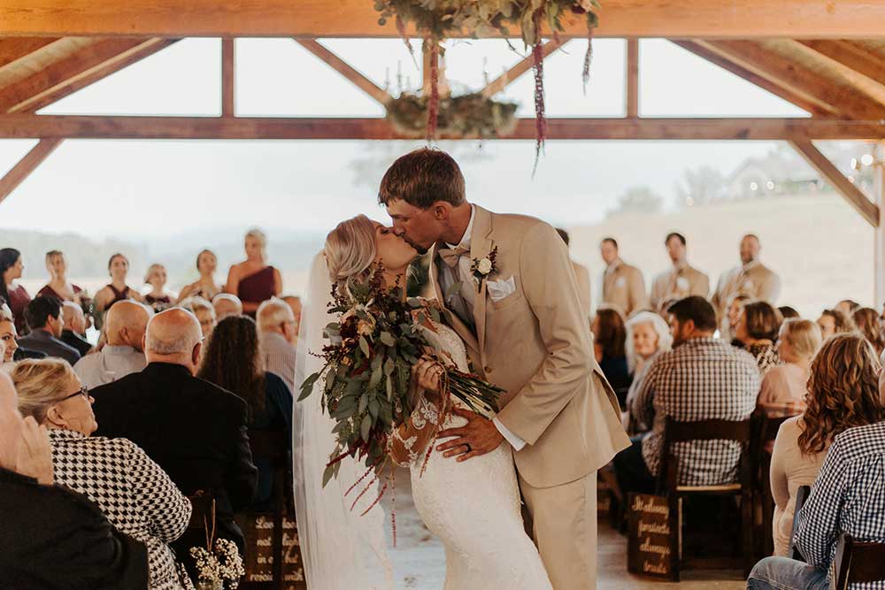 Kaylan-Chris-wedding kissing after ceremony