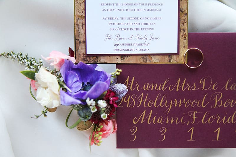 hand lettering burgundy custom invitation closeup