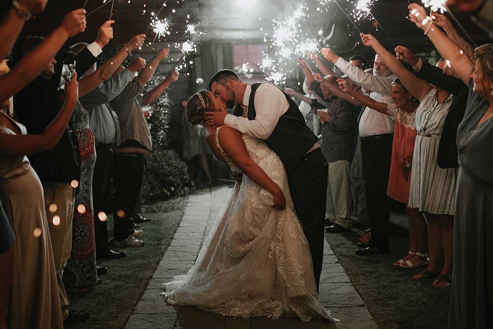kissing wedded couple sparklers