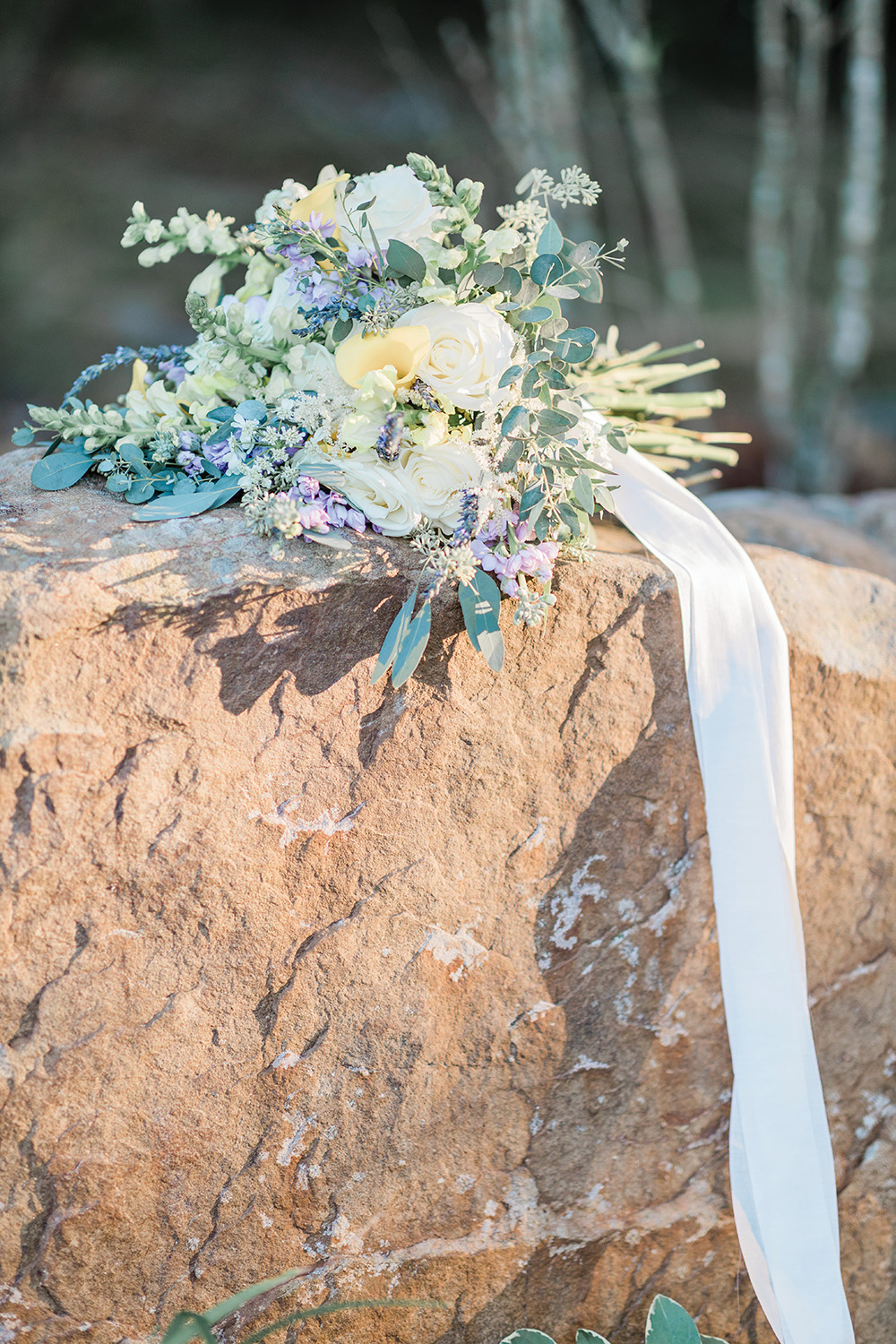 wedding bouquet with yellow, light green and lavender colors